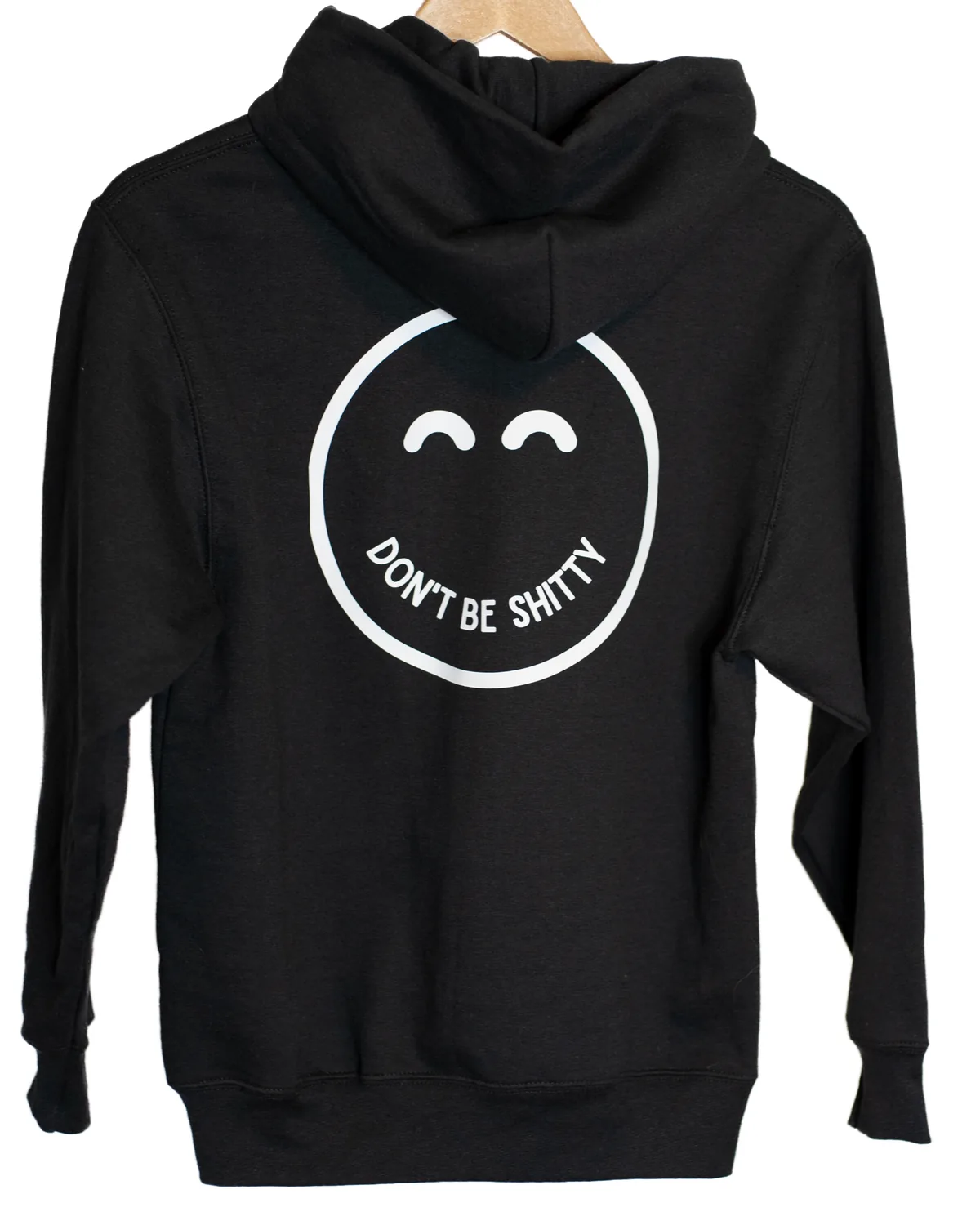 Back of the black DON'T BE SHITTY smiley hoodie showing the large smiley face print
