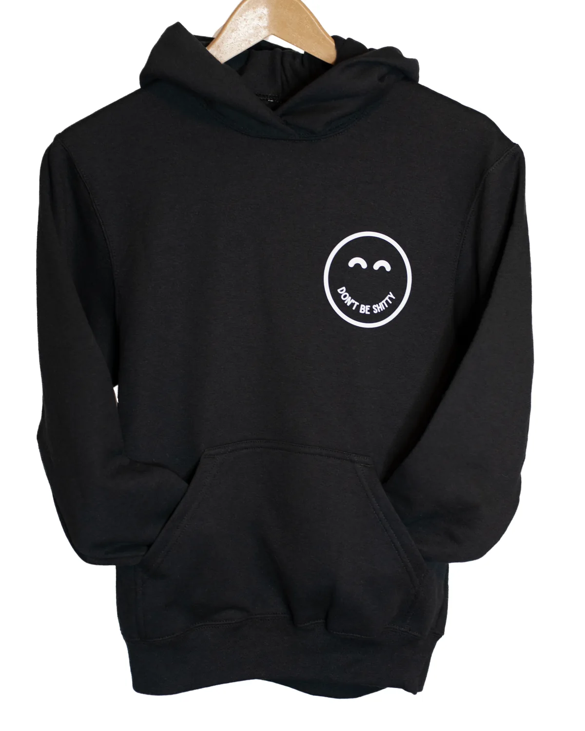 Black DON'T BE SHITTY smiley hoodie on a hanger, small smiley logo on the left chest